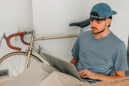 young man or student at home with laptop