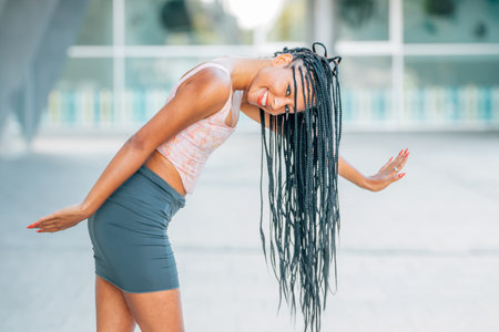 girl on the street with braids on the streetの写真素材