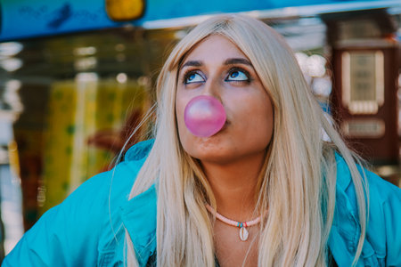 girl in the amusement park with treats