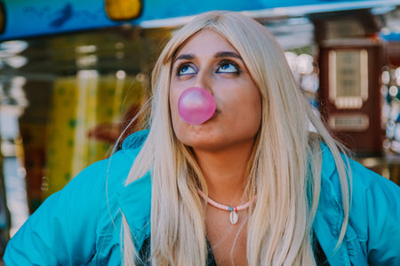 girl in the amusement park with treats