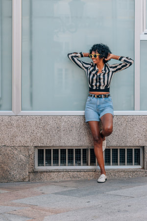 full length latin middle aged woman on the street outdoorsの写真素材