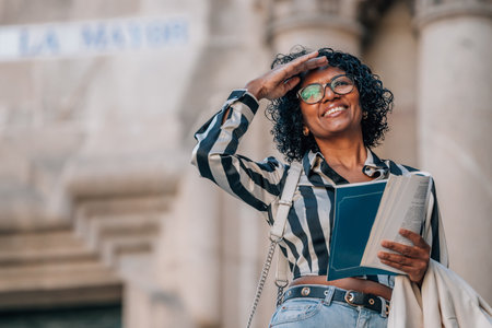 travel tourist woman with guidebook or map on the streetの写真素材