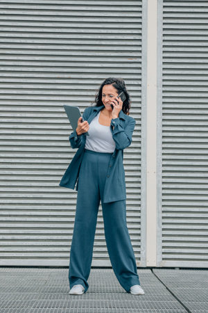 business woman talking on mobile phone with copy-spaceの写真素材