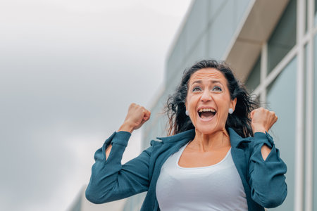 excited business woman euphoric of successの写真素材