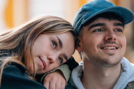 boy and girl couple on the street outdoorsの写真素材