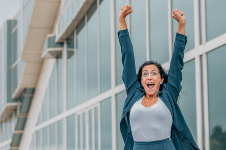 excited business woman euphoric of successの写真素材