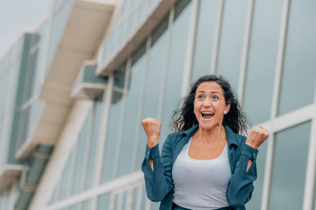 excited business woman euphoric of successの写真素材