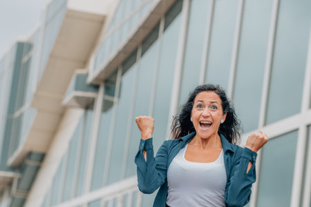 excited business woman euphoric of successの写真素材