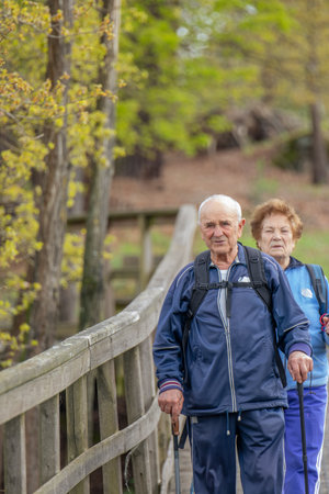senior couple hiking outdoors in natureの写真素材