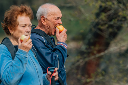 senior couple hiking outdoors in natureの写真素材