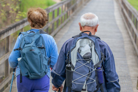 senior couple hiking outdoors in natureの写真素材
