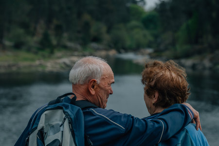 senior couple hiking outdoors in nature