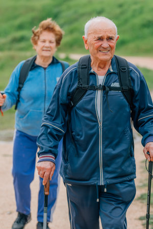 senior couple hiking outdoors in natureの写真素材