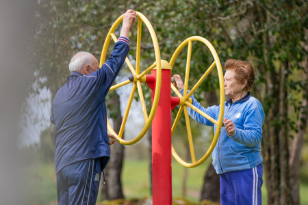 senior couple practicing exercise outdoorsの写真素材