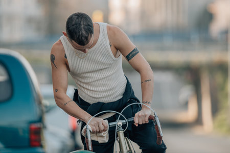 urban young man riding a bicycleの写真素材