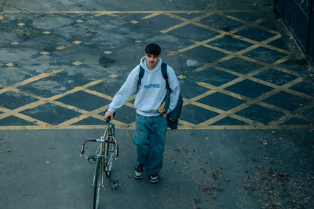 top view of a young man with bicycleの写真素材