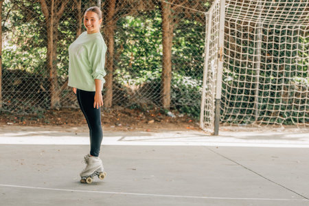 skater training with skates outdoors