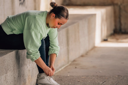 skater putting on skates for trainingの写真素材