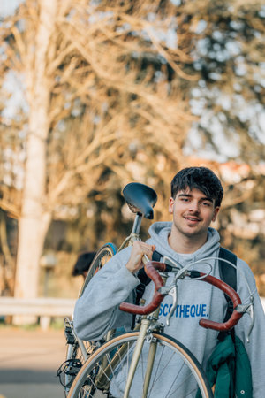 student with vintage bicycle and young american outfit