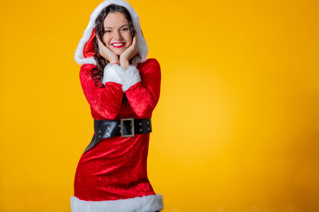 young woman in santa claus costumeの写真素材