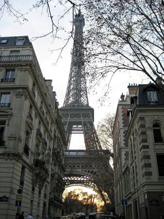 View of the Eiffel Tower among the buildings of the city, Paris, Franceの写真素材