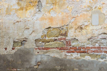 Deterioration of old wall, brick brokenの写真素材