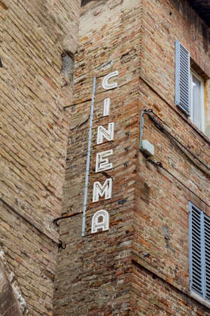 teaches an old cinema in Italy