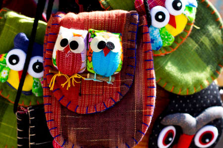Detail of a stand bag, close-up of owlsの写真素材