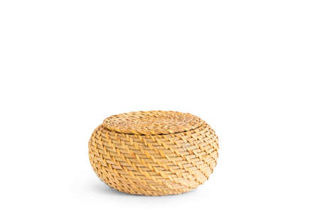 Straw basket closed with content to discover and openの写真素材
