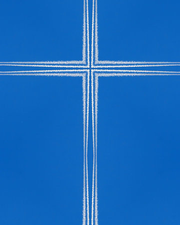 kaleidoscope cross:  jet contrails on blue sky 2の写真素材