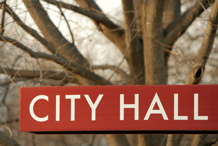 City Hall sign with tree background; North Newton, Kansasの写真素材