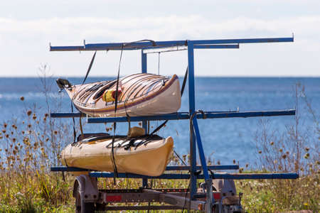 two kayaks on trailer by Atlantic Oceanの写真素材