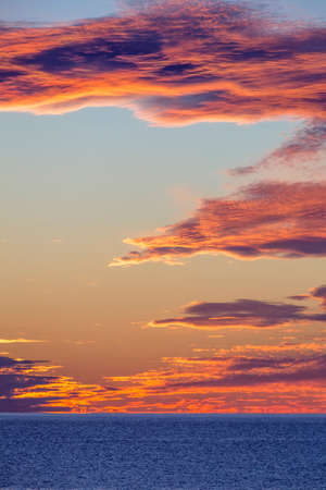vertical sunset; Northumberland Strait, Prince Edward Island, Canadaの写真素材