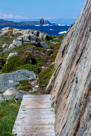 Fogo Island hiking path, rock and icebergs; Newfoundlandの写真素材