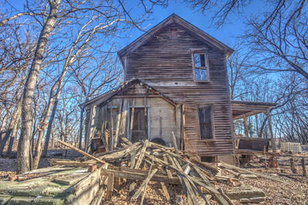 abandoned house in trees, rural Kansas