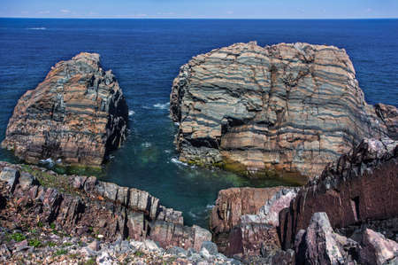 rock layers along Newfoundland coastline near Bonavistaの写真素材