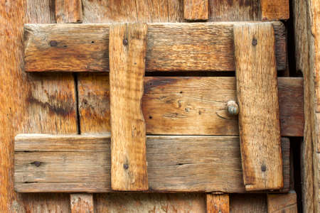 homemade wood latch for shed door on Wyoming ranchの写真素材