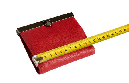 Red wallet and yellow tape measure isolated on a white backgroundの写真素材