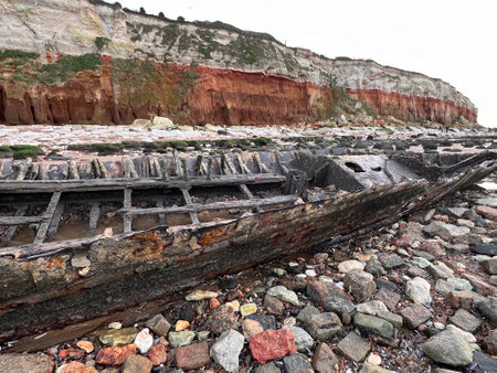 Abandoned shipwreck on the beach in Dorset, UKの写真素材