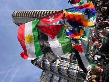 Crowd of people waving flags.の写真素材