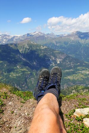 looking on the top of mountainの写真素材