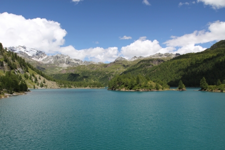 alpine lake in the valleyの写真素材