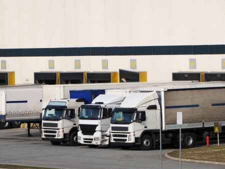 cargo vehicles into logistic centerの写真素材