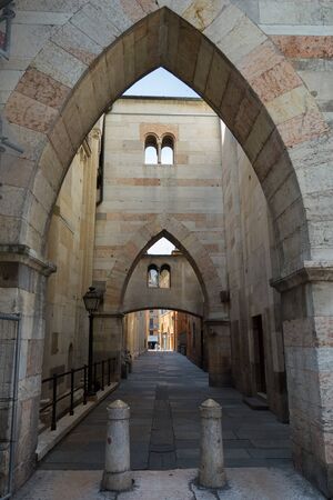 Medieval street at Modena townの写真素材