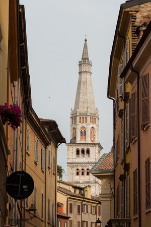 Ghirlandina Tower hidden by historical buildings, Modena