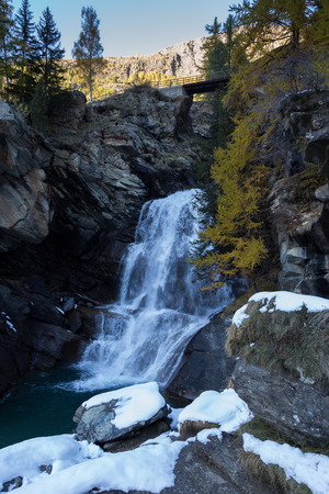 waterfall at Cogne village, Italyの写真素材