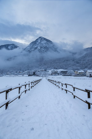 walking in the snow in winter timeの写真素材