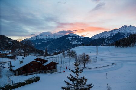 colored sunrize with winter landscapeのeditorial素材