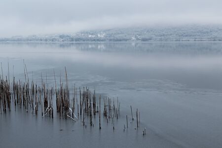 frozen lake during winter seasonの写真素材