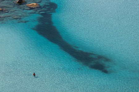 alone in the middle of the waterの写真素材